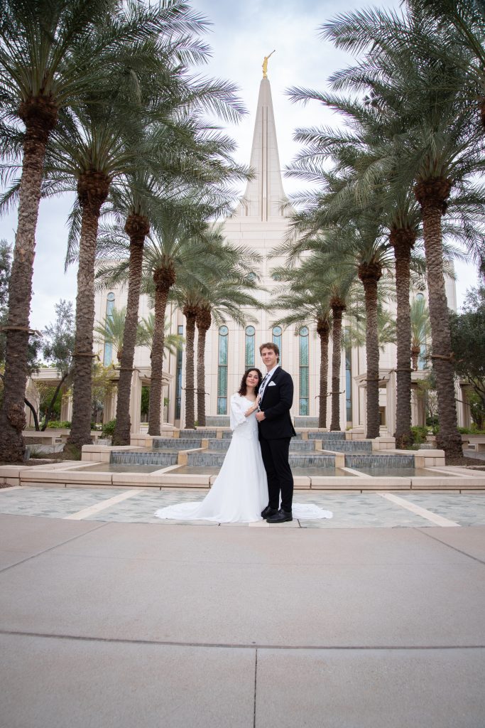 Bride and Groom with palm trees in the background