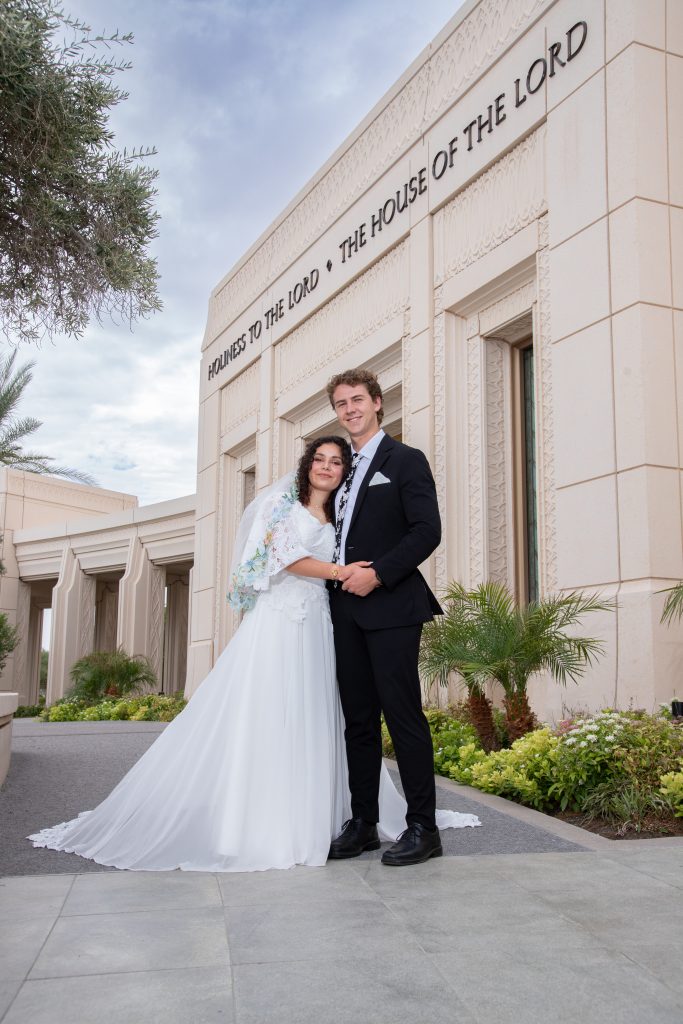 Bride and groom near the front door at the Gilbert Arizona Temple